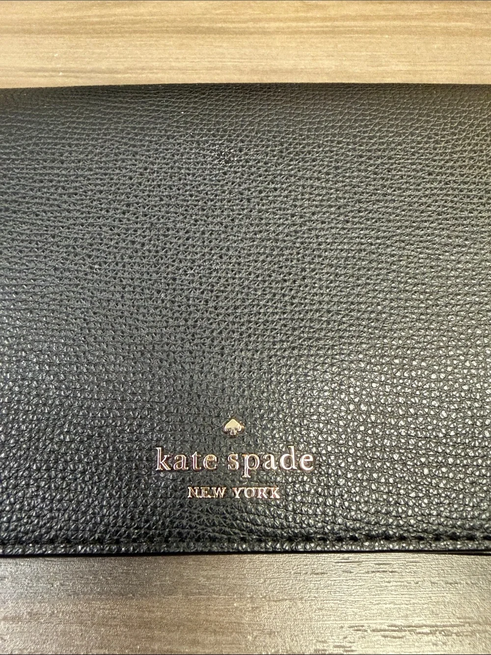 kate spade black pebbled leather snap wallet with gold logo